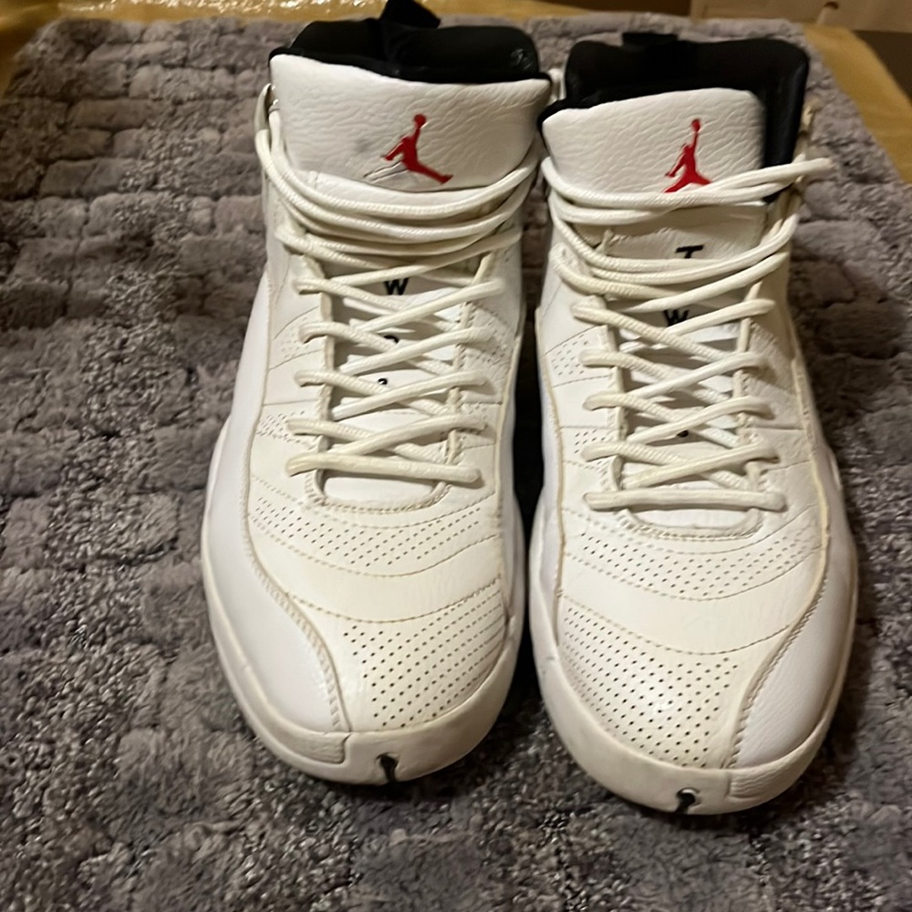 White leather Air Jordan pre-worn fair condition bottoms are good needs insole